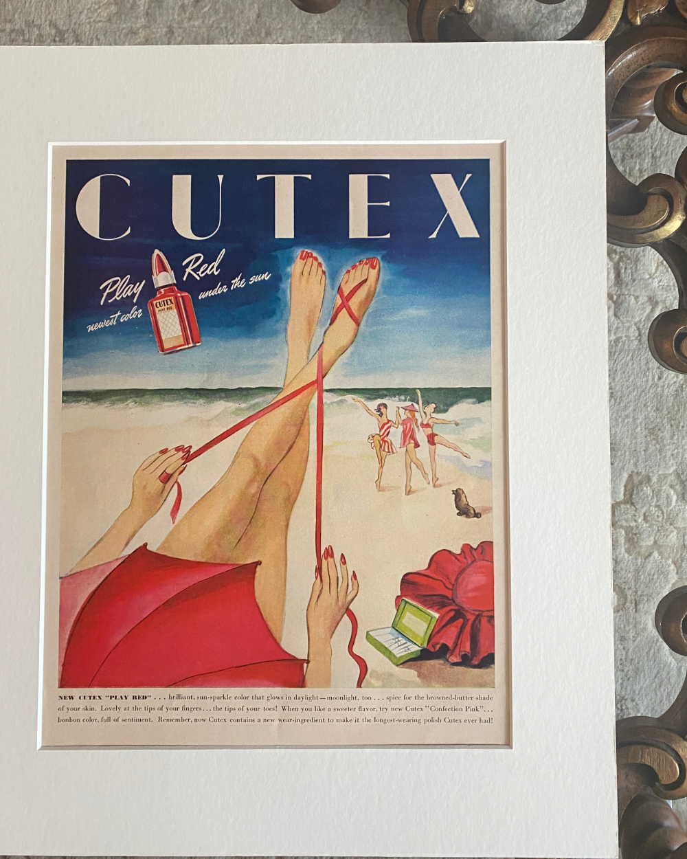 Original 1946 Cutex Play Red Time Magazine advertisement showing a colorful beach illustration before framing