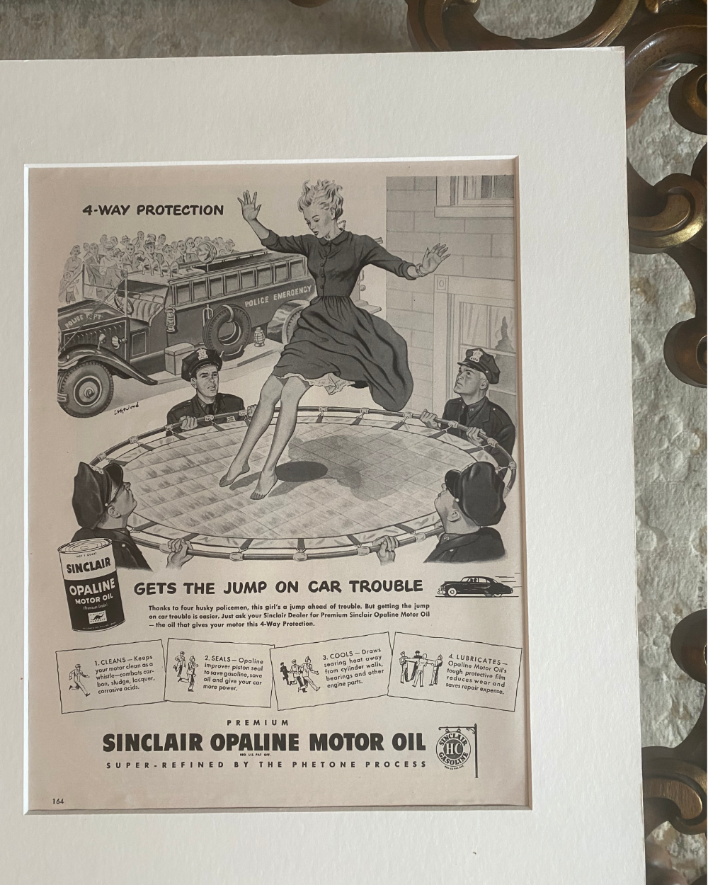 Detail of an authentic 1949 Sinclair Opaline Motor Oil Life magazine advertisement showing its original illustrated artwork