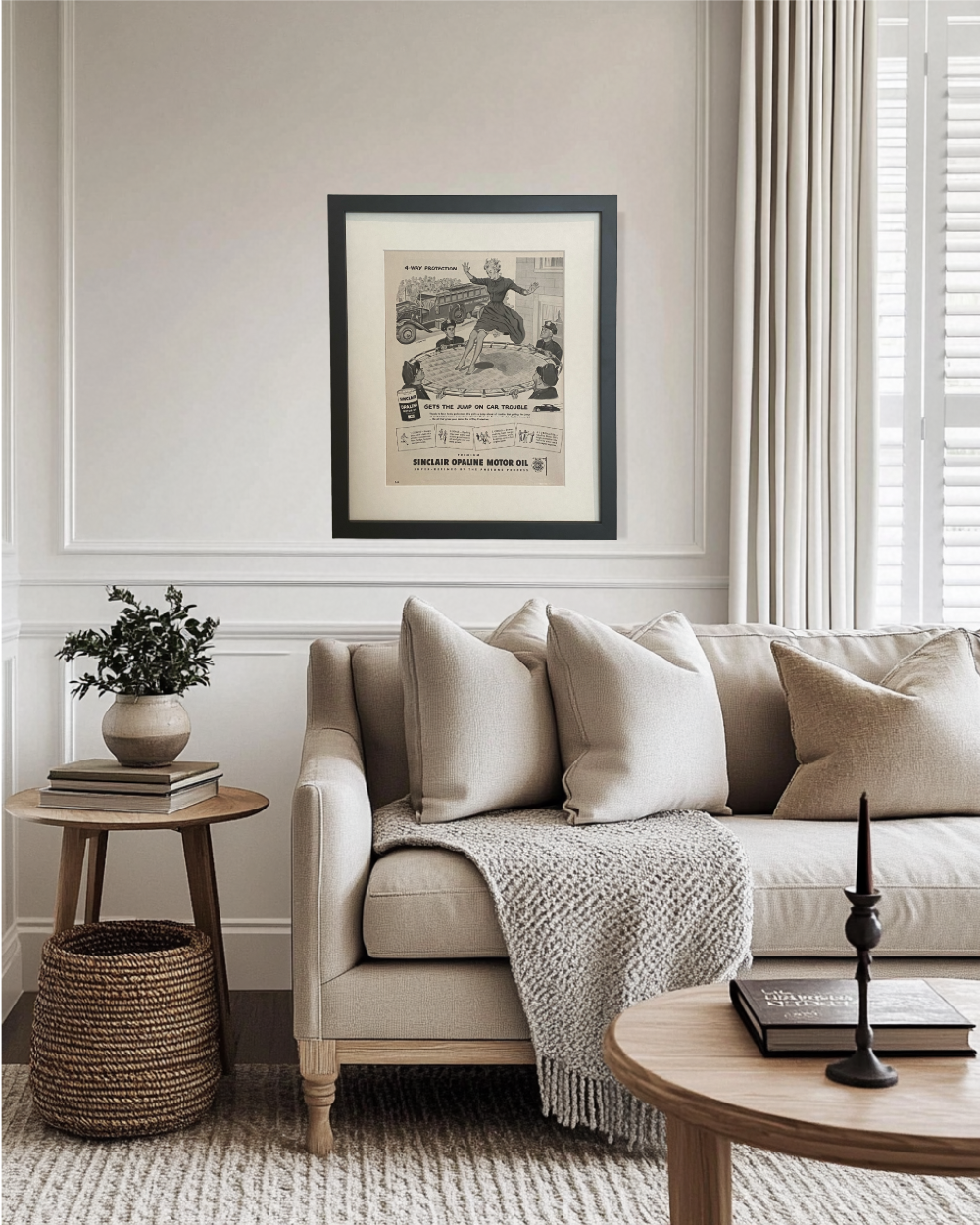 Original 1949 Sinclair Motor Oil advertisement in a black frame styled above a neutral living room sofa