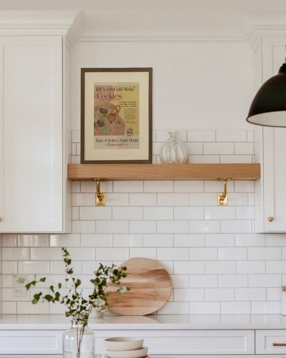 Framed Betty Crocker Cookies vintage magazine advertisement styled on a floating kitchen shelf