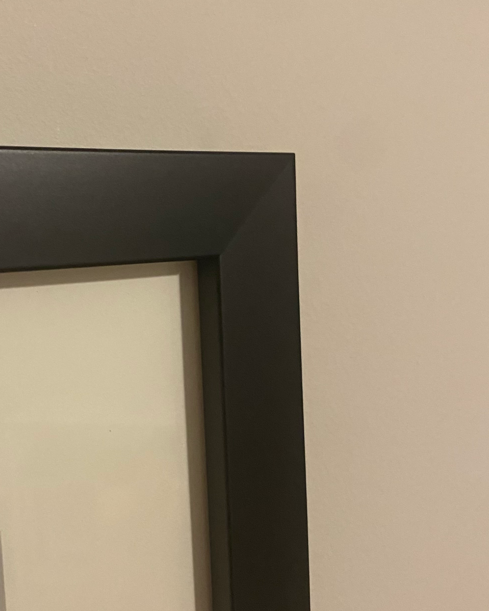 Premium solid wood matte black frame used to professionally finish the original vintage Coca-Cola advertisement
