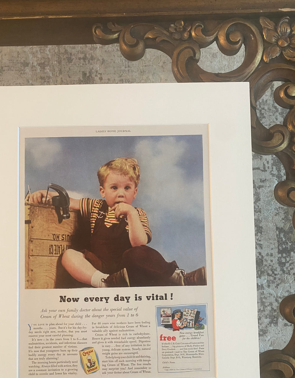 Close-up view of an original 1953 Cream of Wheat magazine advertisement showing artwork, typography, and paper condition.