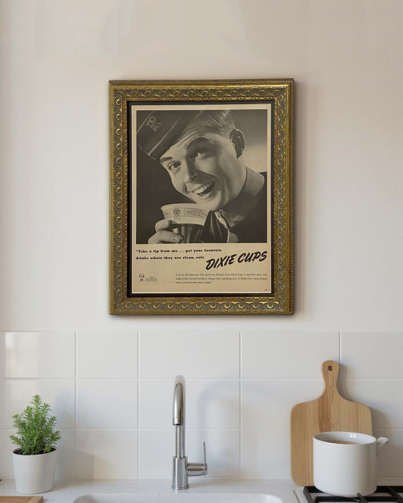 Vintage 1946 Dixie Cups advertisement featuring a smiling serviceman holding a paper 