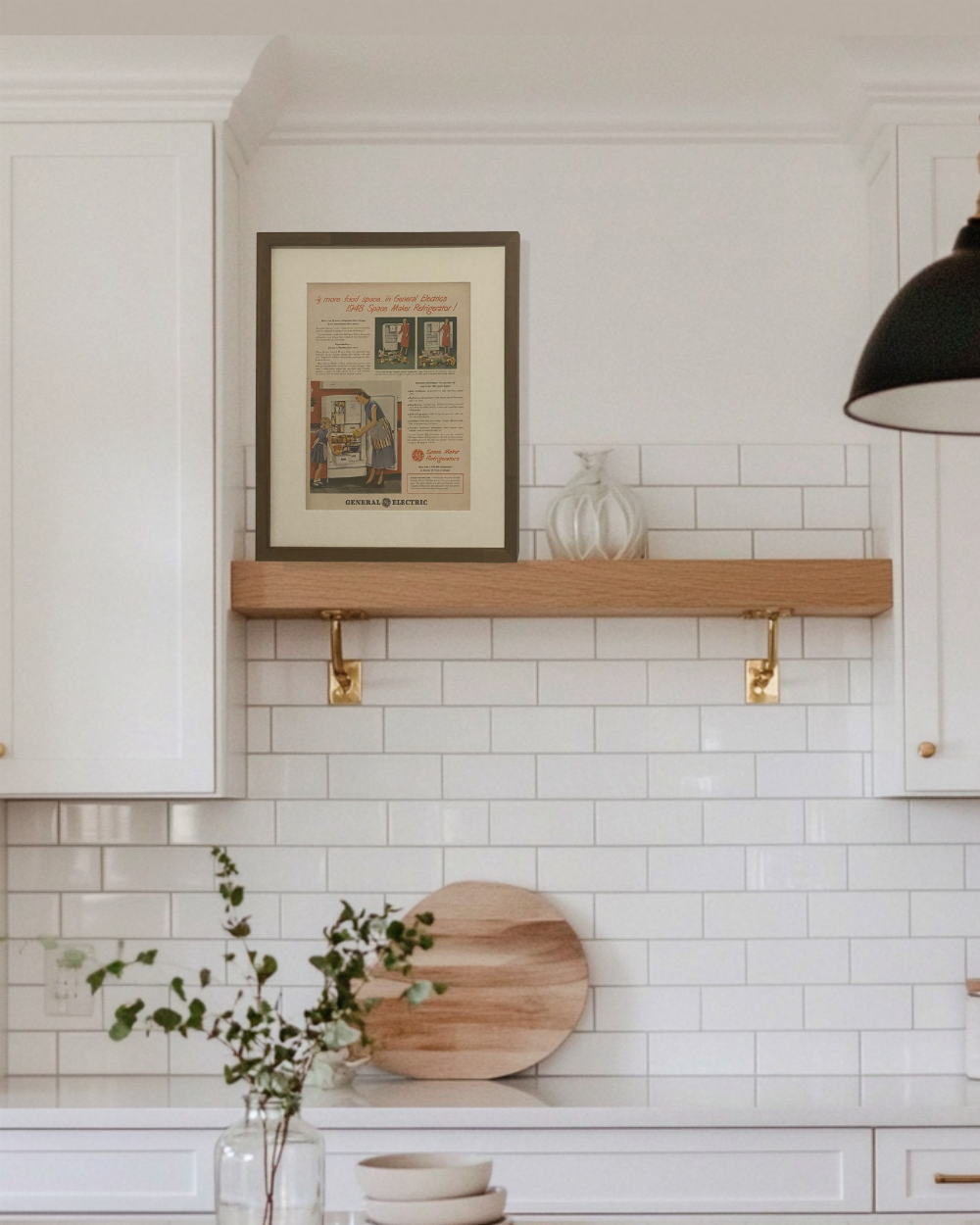 Original 1948 General Electric Space Maker Refrigerator vintage advertisement displayed on a floating kitchen shelf in a handcrafted brown wood frame.