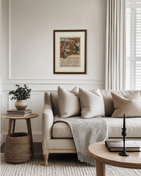 Original Greyhound “Only By Highway” vintage advertisement displayed in a handcrafted brown wood frame in a modern living room.