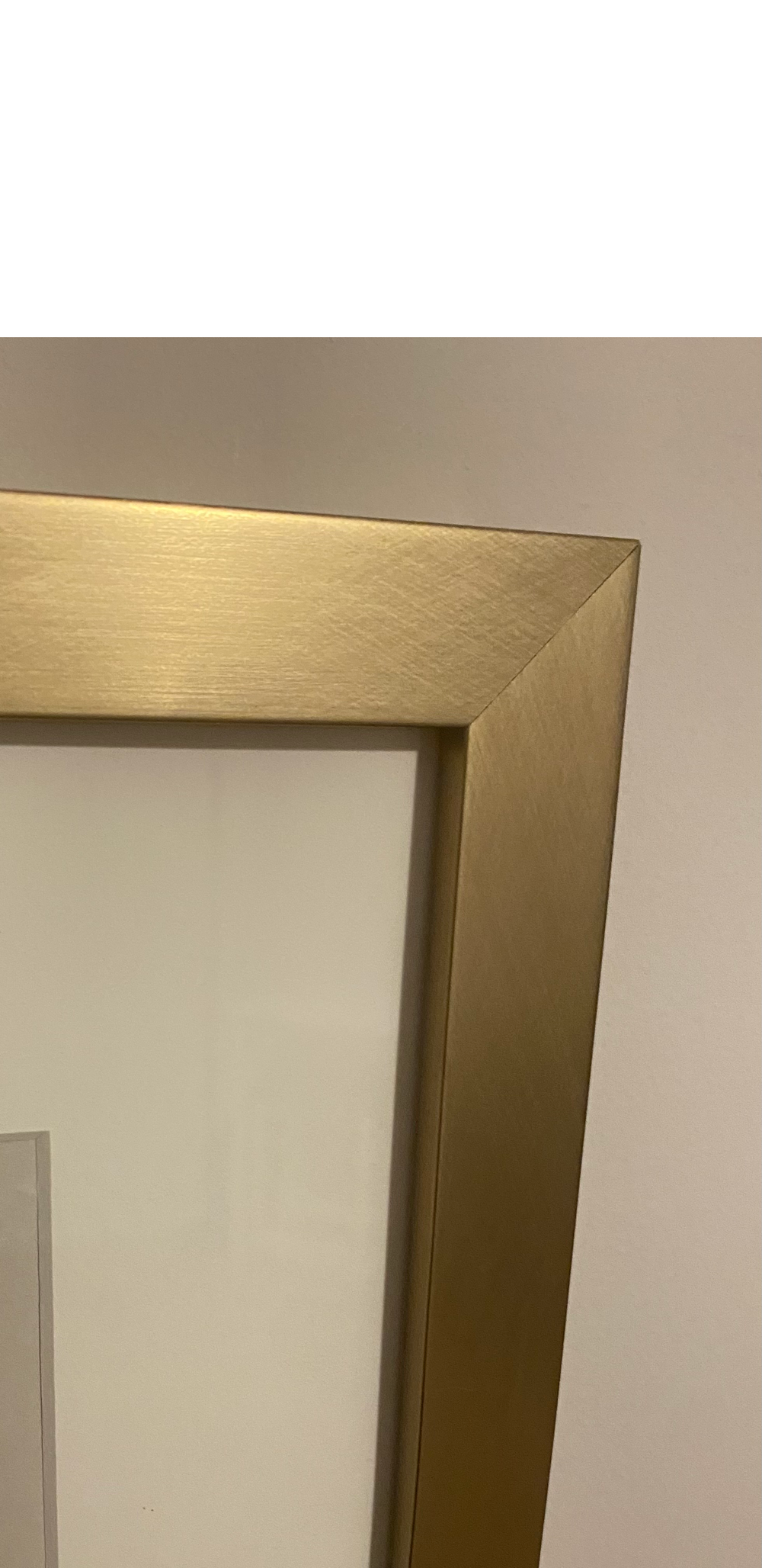 Close-up view of the brass frame corner, off-white mat, and professional craftsmanship surrounding an original 1941 Hires Root Beer magazine advertisement.