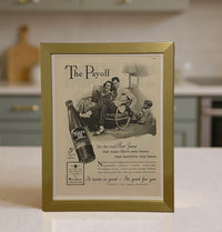 Framed 1941 Hires Root Beer “The Payoff” modern vintage advertisement displayed on a kitchen countertop.
