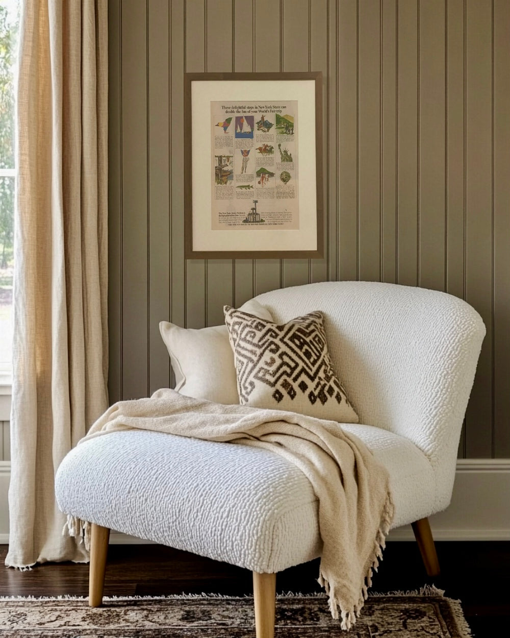 Original New York World’s Fair vintage magazine advertisement framed and displayed above a reading chair in a cozy reading nook.