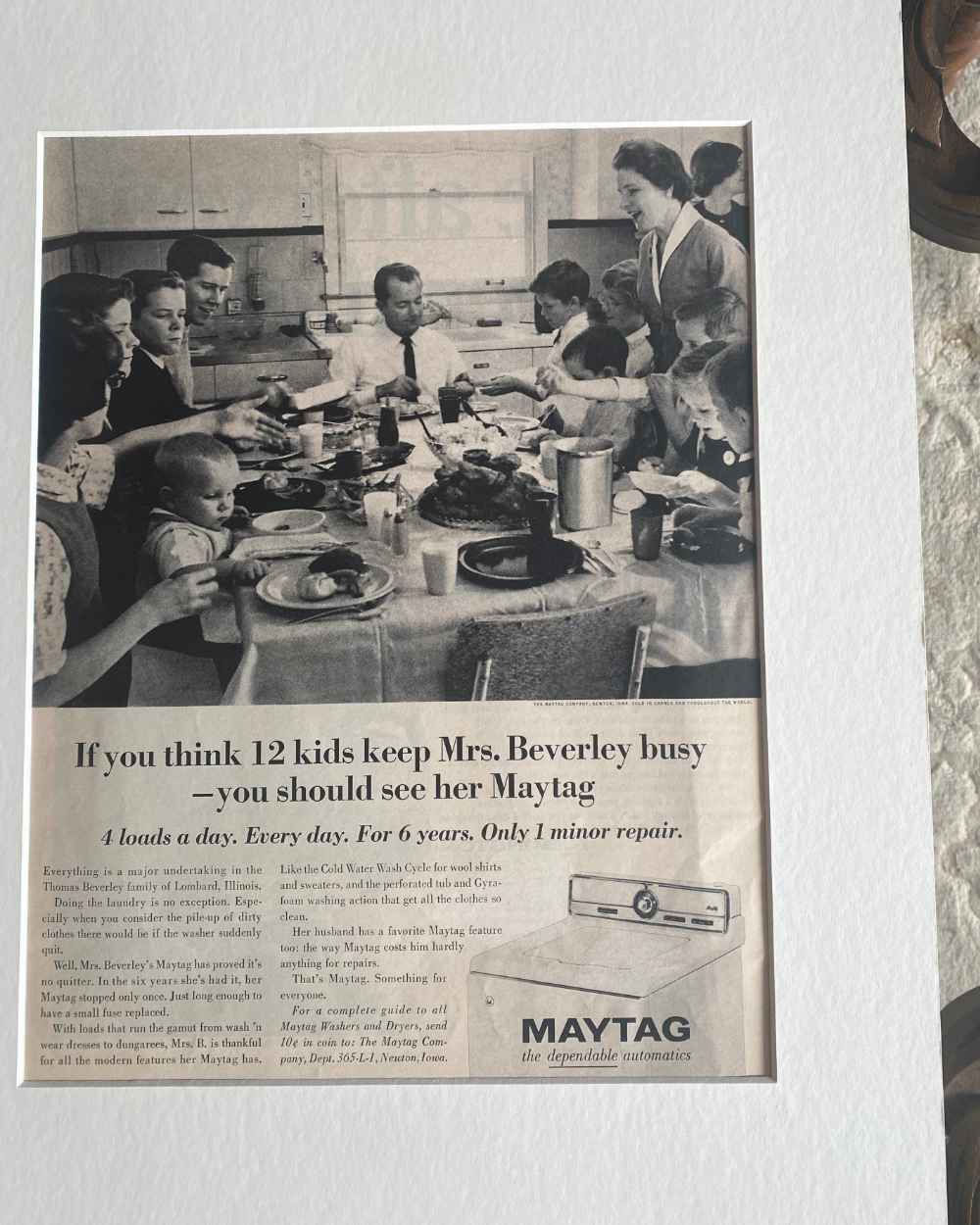 Close-up of an authentic 1965 Maytag magazine advertisement featuring the Beverley family and their twelve children