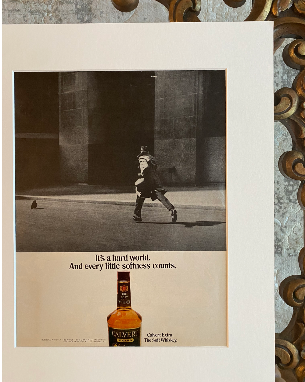 Close-up of the original Calvert Extra “The Soft Whiskey” vintage advertisement showing the dramatic black-and-white artwork, typography, and preserved paper quality.
