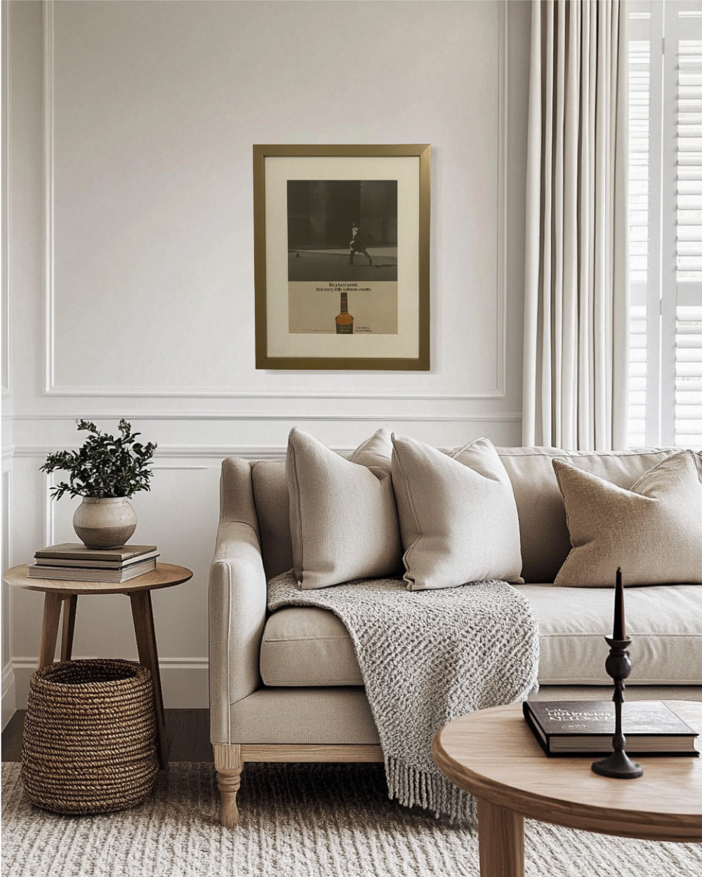 Original Calvert Extra “The Soft Whiskey” vintage advertisement framed in a thin brass frame and displayed on a modern living room wall.