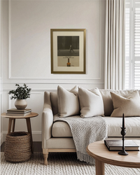 Original Calvert Extra “The Soft Whiskey” vintage advertisement framed in a thin brass frame and displayed on a modern living room wall.