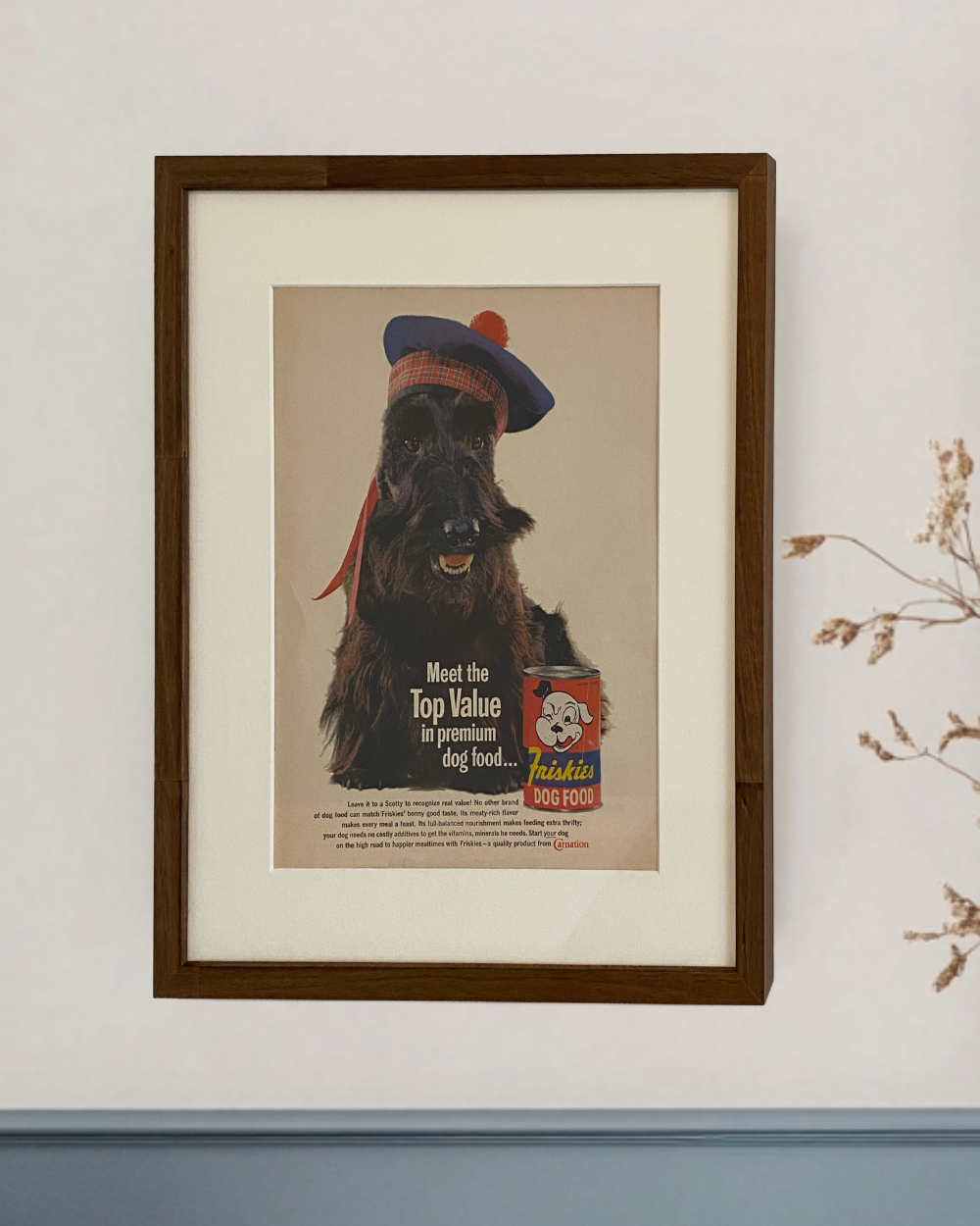 Original Friskies Scotty Dog vintage advertisement displayed in a handcrafted brown wood frame with an off-white mat.