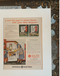 Close-up of the original 1948 General Electric Space Maker Refrigerator vintage advertisement showing the artwork, typography, and preserved paper quality