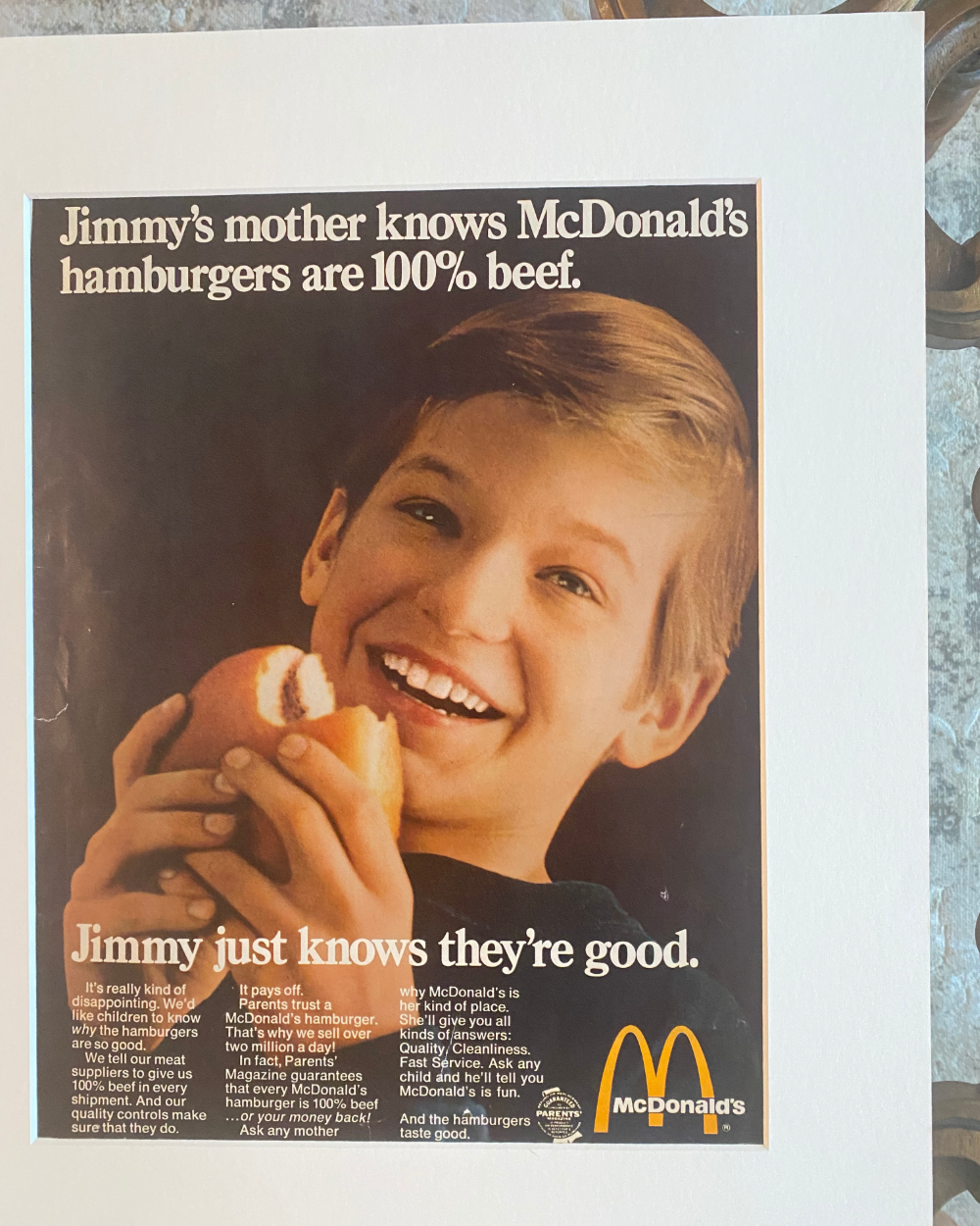 Close-up of the original McDonald’s “Jimmy’s Mother Knows Hamburgers Are 100% Beef” vintage advertisement showing the artwork, typography, and preserved paper quality.