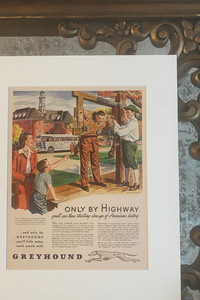 Corner detail of the walnut brown frame and matting used for an original vintage magazine advertisement.